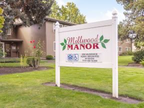 a sign that reads in front of a house