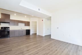 a kitchen and living room in a 555 waverly unit
