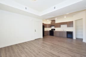 a kitchen and living room in a 555 waverly unit