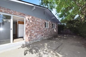 a view of the back of the house from the driveway