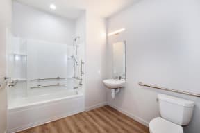 a bathroom with a toilet sink and bathtub