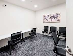 a conference room with chairs and a table