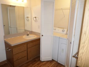 Wellington Estates bathroom with washer and dryer