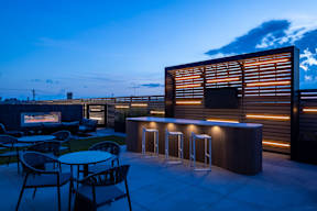 Pool and spa deck with outdoor TV and grills
