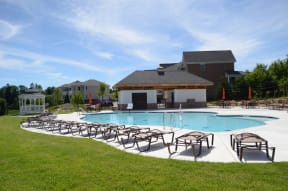 Refreshing sparkling swimming pool, perfect for relaxation and leisure, at Claremont Apartments in Exton, PA