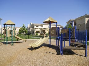 Roseville Apartments - Children's Playground In A Grassy Area