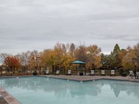 Relaxing Pool Area With Sundeck at Edgewater Apartments, Boise, ID, 83703