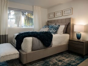 Spacious Bedroom With Comfortable Bed at Edgewater Apartments, Boise, Idaho