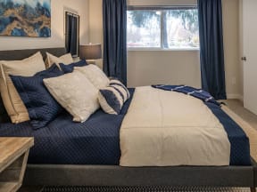 Comfortable Bedroom With Large Window at Edgewater Apartments, Idaho
