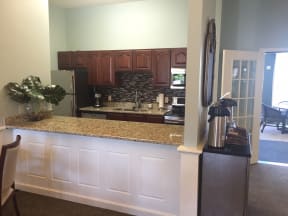 Gourmet Kitchens with Islands, Caesarstone Countertops, and Decorative Backsplash at Nicolet Highlands Apartments 55+, Wisconsin, 54115