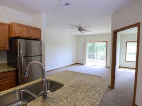 Living Room With Attached Balcony at The Highlands at Mahler Park Apartments 55+, Neenah, 54956