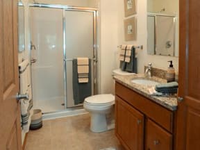 Spacious Bathrooms With Granite Style Countertops at The Highlands at Mahler Park Apartments 55+, Neenah, Wisconsin