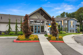 Leasing Office Entrance with Paved Path, Trees, Building Front Entrance,