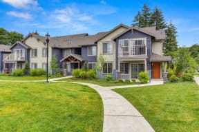 Property Grounds with Walking Path, Grass and Apartment Exterior