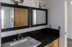 Renovated Bathrooms With Quartz Counters at 1525 Broadway, Michigan