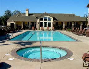 Chico Apartments For Rent - Gated Sparkling Pool With Hot Tub, Lounge Chairs, And Club House In The Background