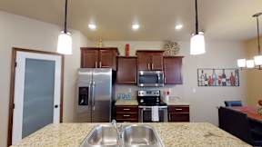 kitchen pantry, cabinets, counter