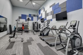cardio machines in the fitness center at Carol Stream Crossing