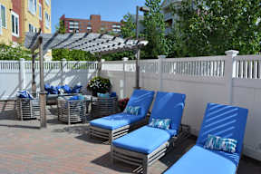 Parkside courtyard with lounge sunbathing chairs