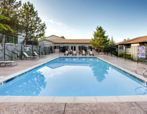 Pool and lounge chairs at Southridge Apt Home Rentals Reno NV