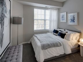 Bedroom With Plenty Of Natural Lights at The MilTon Luxury Apartments