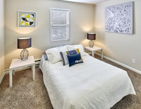 Carpeted bedroom to fit a queen sized bed and two side tables. One window over the bed.at Woodhaven, Everett, WA