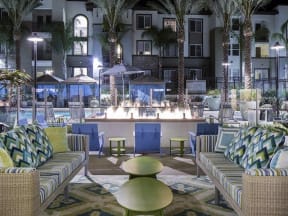 a lobby with couches and chairs and a fountain
