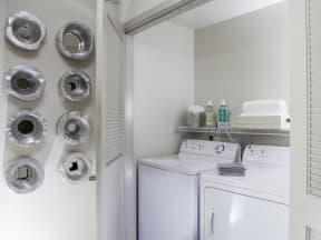 a white washer and dryer in a room