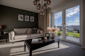 a living room with a couch and a table