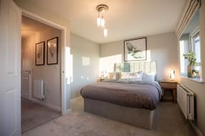 a bedroom with a bed and a closet