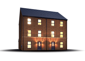 A three-story brick building with a black roof and lit windows.
