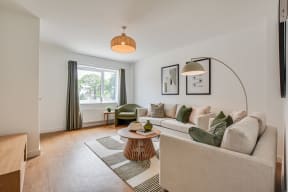 a living room with a couch and a coffee table