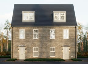A house with a black roof and white doors and windows.
