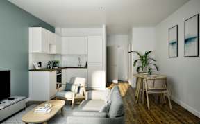A living room with a grey couch, wooden coffee table, and a television.