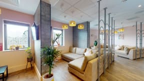 a living room with couches and a table