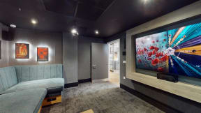 a living room with a couch and a tv