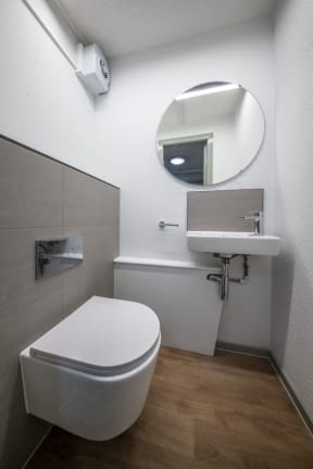 a small bathroom with a toilet and a sink