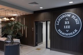 the lobby of a restaurant with a sign on the wall that reads barrow palace