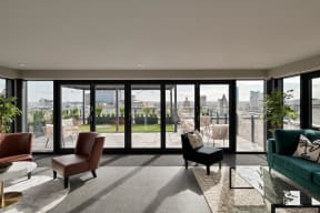 a living room with a view of the city