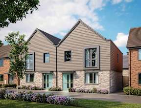 A modern house with a grey front and a green door at The Foundry Apartments, Bordon, GU35 9FE