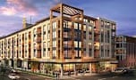 a rendering of a large building on a city street