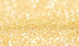 a close up of a glittery gold background