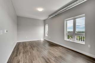 Wood-Style Flooring With Large Windows