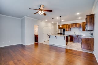 Spacious Kitchen Area & Living Room With Ceiling Fan