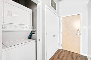 a laundry room with a washer and dryer
