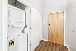 a laundry room with a washer and dryer