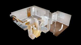 A 3D rendered image of a house layout.