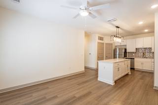 Open concept living area with kitchen at Allure Apartments, Whiteland, Indiana