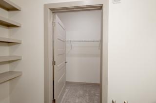 Walk-in closet with wire shelving and carpet at Allure Apartments, Whiteland, 46184