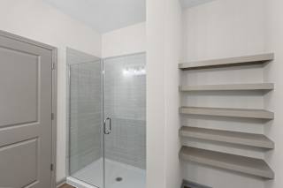 Bathroom With Storage Area at Arlington Farms, Greenwood, Indiana